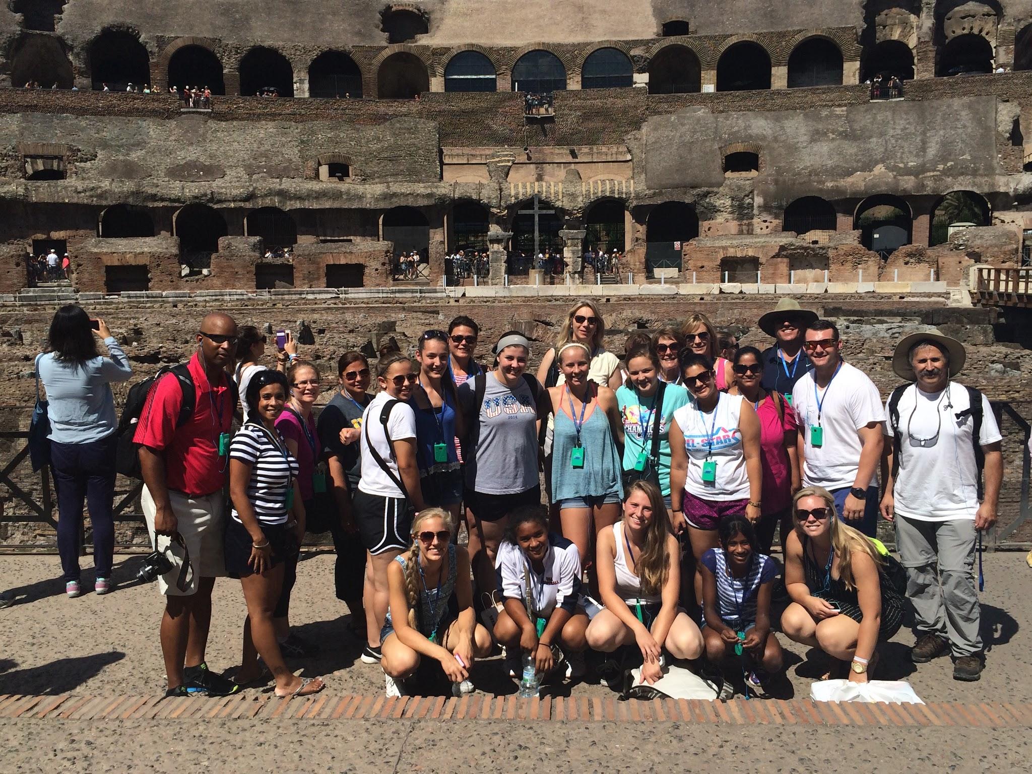 Team gathered near the Colosseum during an international tour